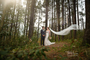 bride and groom veil in wind