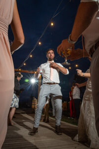 Groom dancing at Inveremere wedding